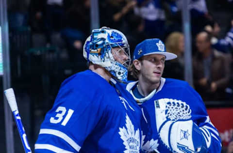 TORONTO, ON – FEBRUARY 6: Frederik Andersen #31 of the Toronto Maple Leafs celebrates with Garret Sparks #40 after defeating the Ottawa Senators at the Scotiabank Arena on February 6, 2019 in Toronto, Ontario, Canada. (Photo by Kevin Sousa/NHLI via Getty Images)