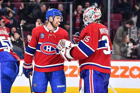 MONTREAL, CANADA – MARCH 21: Mike Matheson #8 of the Montreal Canadiens and goaltender Sam Montembeault #35 celebrate a victory against the Tampa Bay Lightning at Centre Bell on March 21, 2023 in Montreal, Quebec, Canada. The Montreal Canadiens defeated the Tampa Bay Lightning 3-2. (Photo by Minas Panagiotakis/Getty Images)