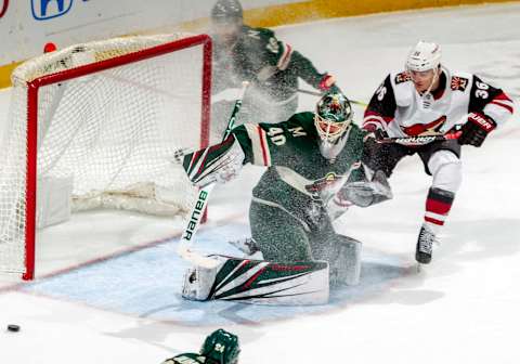 ST. PAUL, MN – OCTOBER 16: Devan Dubnyk #40 of the Minnesota Wild makes a save on Christian Fischer #36 of the Arizona Coyotes during a game between the Minnesota Wild and Arizona Coyotes at Xcel Energy Center on October 16, 2018 in St. Paul, Minnesota. The Wild defeated the Coyotes 2-1.(Photo by Bruce Kluckhohn/NHLI via Getty Images)