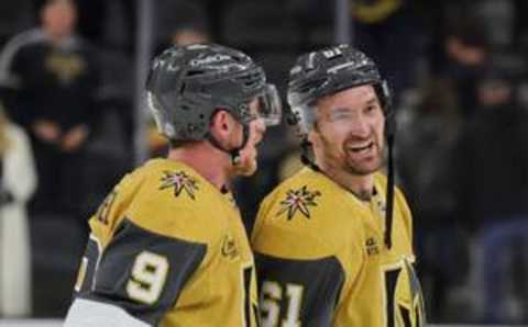 LAS VEGAS, NEVADA – DECEMBER 12: Jack Eichel #9 and Mark Stone #61 of the Vegas Golden Knights react after Stone scored a goal against the Calgary Flames in overtime to win their game 5-4 at T-Mobile Arena on December 12, 2023 in Las Vegas, Nevada. (Photo by Ethan Miller/Getty Images)