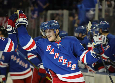 NEW YORK, NEW YORK – OCTOBER 29: Adam Fox #23 of the New York Rangers celebrates his first NHL goal at 17:24 of the third period against the Tampa Bay Lightning at Madison Square Garden on October 29, 2019 in New York City. The Rangers defeated the Lightning 4-1. (Photo by Bruce Bennett/Getty Images)