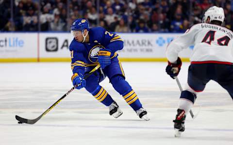 Feb 28, 2023; Buffalo, New York, USA; Buffalo Sabres right wing Kyle Okposo (21) skates with the puck during the second period against the Columbus Blue Jackets at KeyBank Center. Mandatory Credit: Timothy T. Ludwig-USA TODAY Sports