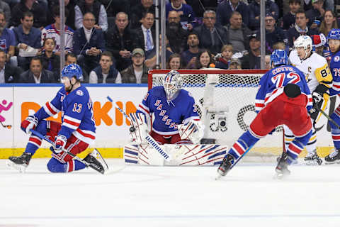 May 3, 2022; New York, New York, USA; New York Rangers goaltender Igor Shesterkin (31) makes a save against the Pittsburgh Penguins during the second period in game one of the first round of the 2022 Stanley Cup Playoffs at Madison Square Garden. Mandatory Credit: Vincent Carchietta-USA TODAY Sports