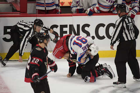 Oct 23, 2021; Ottawa, Ontario, CAN; New York Rangers left wing Sammy Blais (91) fights with Ottawa Senators let wing Nick Paul (21) in the third period at the Canadian Tire Centre. Mandatory Credit: Marc DesRosiers-USA TODAY Sports