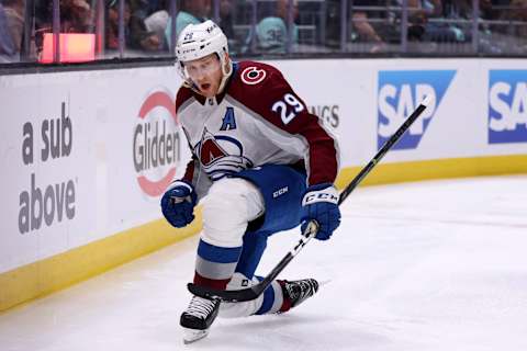 SEATTLE, WASHINGTON – APRIL 22: Nathan MacKinnon #29 of the Colorado Avalanche celebrates his goal against the Seattle Kraken during the third period in Game Three of the First Round of the 2023 Stanley Cup Playoffs at Climate Pledge Arena on April 22, 2023 in Seattle, Washington. (Photo by Steph Chambers/Getty Images)