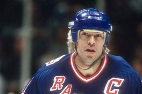 EAST RUTHERFORD, NJ – CIRCA 1993: Mark Messier #11 of the New York Rangers skates against the New Jersey Devils during an NHL Hockey game circa 1993 at the Brendan Byrne Arena in East Rutherford, New Jersey. Messier’s playing career went from 1978-2004. (Photo by Focus on Sport/Getty Images)