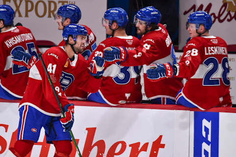 MONTREAL, QC – FEBRUARY 19: Ryan Poehling #41 of the Laval Rocket celebrates his goal with teammates on the bench during the first period against the Belleville Senators at the Bell Centre on February 19, 2021 in Montreal, Canada. (Photo by Minas Panagiotakis/Getty Images)