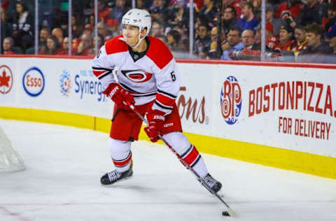 NHL Trade Rumors: Carolina Hurricanes defenseman Noah Hanifin (5) controls the puck against Calgary Flames during the third period at Scotiabank Saddledome. Carolina Hurricanes won 4-2. Mandatory Credit: Sergei Belski-USA TODAY Sports