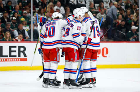 ST PAUL, MN – OCTOBER 13: Artemi Panarin #10 of the New York Rangers celebrates his goal against the Minnesota Wild with teammates in the first period of the game at Xcel Energy Center on October 13, 2022, in St Paul, Minnesota. The Rangers defeated the Wild 7-3. (Photo by David Berding/Getty Images)