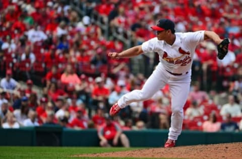 May 1, 2016; St. Louis, MO, USA; St. Louis Cardinals relief pitcher Seung Hwan Oh (26) pitches to a Washington Nationals batter during the eighth inning at Busch Stadium. The Nationals won 6-1 and completed the sweep of the Cardinals. Mandatory Credit: Jeff Curry-USA TODAY Sports