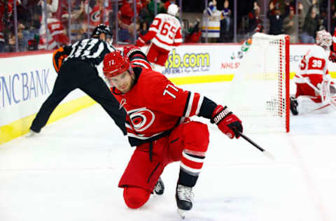 RALEIGH, NORTH CAROLINA – DECEMBER 16: Tony DeAngelo #77 of the Carolina Hurricanes celebrates a goal scored during the first period of the game against the Detroit Red Wings at PNC Arena on December 16, 2021, in Raleigh, North Carolina. (Photo by Jared C. Tilton/Getty Images)