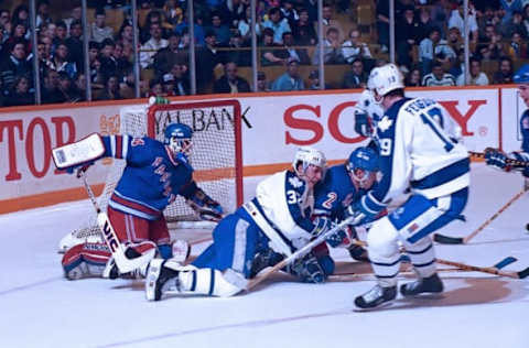 John Vanbiesbrouck #34 and Brian Leetch #2 of the New York Rangers (Photo by Graig Abel/Getty Images)