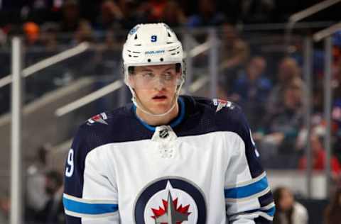 ELMONT, NEW YORK – MARCH 11: Andrew Copp #9 of the Winnipeg Jets skates against the New York Islanders at UBS Arena on March 11, 2022, in Elmont, New York. (Photo by Bruce Bennett/Getty Images)