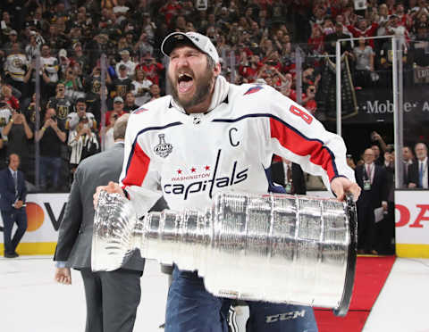 LAS VEGAS, NV – JUNE 07: Alex Ovechkin #8 of the Washington Capitals carries the Stanley Cup in celebration after his team defeated the Vegas Golden Knights 4-3 in Game Five of the 2018 NHL Stanley Cup Final at the T-Mobile Arena on June 7, 2018 in Las Vegas, Nevada. (Photo by Bruce Bennett/Getty Images)