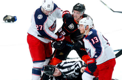 ANAHEIM, CA – MARCH 2: Jakob Silfverberg #33 and Andrew Cogliano #7 of the Anaheim Ducks battle in a fight against Ryan Murray #27 and Cam Atkinson #13 of the Columbus Blue Jackets during the game on March 2, 2018. (Photo by Debora Robinson/NHLI via Getty Images)