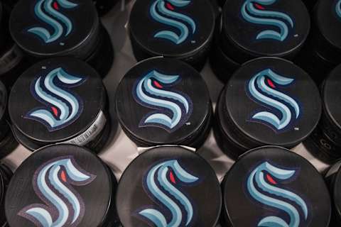 Some of the first Seattle Kraken pucks. (Photo by Jim Bennett/Getty Images)