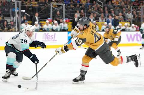 Nov 25, 2022; Las Vegas, Nevada, USA; Vegas Golden Knights center Paul Cotter (43) shoots against the stick of Seattle Kraken defenseman Vince Dunn (29) during the first period at T-Mobile Arena. Mandatory Credit: Stephen R. Sylvanie-USA TODAY Sports