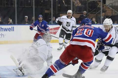 NEW YORK, NEW YORK – FEBRUARY 04: Jonathan Quick #32 of the Los Angeles Kings makes the second period stop on Chris Kreider #20 of the New York Rangers at Madison Square Garden on February 04, 2019 in New York City. (Photo by Bruce Bennett/Getty Images)