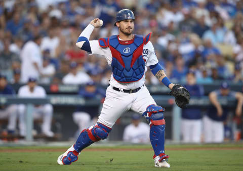 LOS ANGELES, CA – OCTOBER 26: Yasmani Grandal #9 of the Los Angeles Dodgers throws out the runner during the second inning against the Boston Red Sox in Game Three of the 2018 World Series at Dodger Stadium on October 26, 2018 in Los Angeles, California. (Photo by Ezra Shaw/Getty Images)