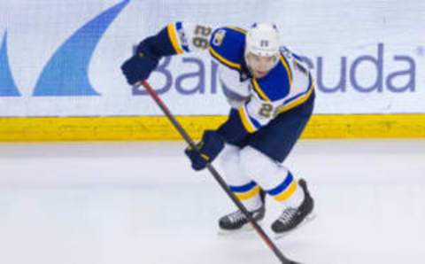 Mar 16, 2017; San Jose, CA, USA; St. Louis Blues center Paul Stastny (26) settles the puck in the San Jose Sharks zone in the second period at SAP Center at San Jose. The Blues won 4-1. (Andrew Villa-USA TODAY Sports)