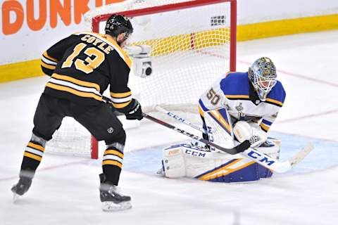 BOSTON, MA – JUNE 6: Boston Bruins center Charlie Coyle (13) waits to see if St. Louis Blues goaltender Jordan Binnington (50) will cough up a rebound puck. During Game 5 of the Stanley Cup Finals featuring the Boston Bruins against the St. Louis Blues on June 6, 2019 at TD Garden in Boston, MA. (Photo by Michael Tureski/Icon Sportswire via Getty Images)