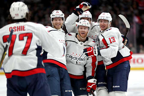 DENVER, COLORADO – FEBRUARY 13: Lars Eller #20, Nick Jensen #3, Alex Ovechkin #8 and Jakub Vrana #13 of the Washington Capitals celebrate the go ahead goal by T.J. Oshie #77 against the Colorado Avalanche in the third period at the Pepsi Center on February 13, 2020 in Denver, Colorado. (Photo by Matthew Stockman/Getty Images)