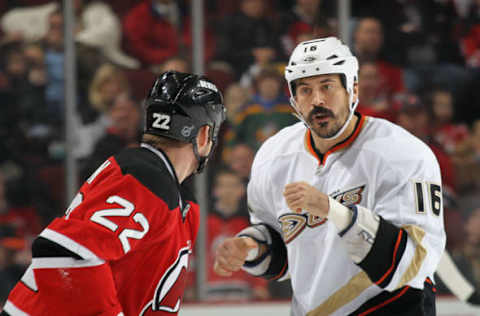 NEWARK, NJ – FEBRUARY 17: Eric Boulton #22 of the New Jersey Devils and George Parros #16 of the Anaheim Ducks prepare to battle at the Prudential Center on February 17, 2012. (Photo by Bruce Bennett/Getty Images)