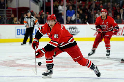 RALEIGH, NC – FEBRUARY 2: Teuvo Teravainen #86 of the Carolina Hurricanes looks to gain control of a loose puck during an NHL game against the Vancouver Canucks on February 2, 2020 at PNC Arena in Raleigh, North Carolina. (Photo by Gregg Forwerck/NHLI via Getty Images)