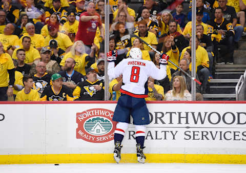 PITTSBURGH, PA – MAY 01: Washington Capitals Left Wing Alex Ovechkin (8) jumps into the glass after scoring the game winning goal during the third period. The Washington Capitals defeated the Pittsburgh Penguins 4-3 in Game Three of the Eastern Conference Second Round during the 2018 NHL Stanley Cup Playoffs on May 1, 2018, at PPG Paints Arena in Pittsburgh, PA. (Photo by Jeanine Leech/Icon Sportswire via Getty Images)