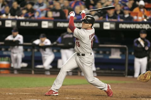 St. Louis Cardinals Jim Edmonds in action against the New York Mets during game 2 of the MLB National League Championship Series played at Shea Stadium in Flushing, N.Y. Cardinals defeated the Mets 9 – 6 on October 13, 2006. (Photo by Bryan Yablonsky/Getty Images)