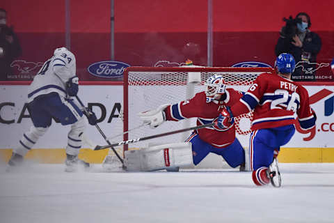 MONTREAL, QC – MAY 03: Goaltender Jake Allen #34 of the Montreal Canadiens stretches out the right pad to make a save on Auston Matthews #34 of the Toronto Maple Leafs  (Photo by Minas Panagiotakis/Getty Images)