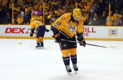 Jun 11, 2017; Nashville, TN, USA; Nashville Predators left wing James Neal (18) and center Mike Fisher (12) react after an empty net goal by Pittsburgh Penguins left wing Carl Hagelin (not pictured) in the third period in game six of the 2017 Stanley Cup Final at Bridgestone Arena. Mandatory Credit: Jerry Lai-USA TODAY Sports