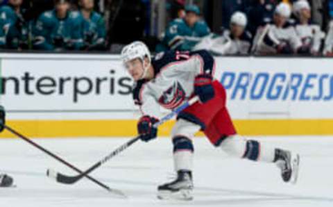 Apr 19, 2022; San Jose, California, USA; Columbus Blue Jackets defenseman Nick Blankenburg (77) watches the puck after shooting it to the goal during the first period against the San Jose Sharks at SAP Center at San Jose. Mandatory Credit: Stan Szeto-USA TODAY Sports