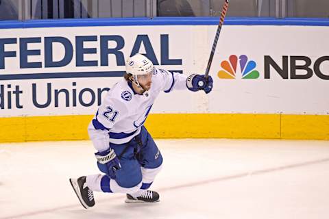 Aug 26, 2020; Toronto, Ontario, CAN; Tampa Bay Lightning center Brayden Point (21) celebrates scoring a goal against the Boston Bruins during the second period in game three of the second round of the 2020 Stanley Cup Playoffs at Scotiabank Arena. Mandatory Credit: Dan Hamilton-USA TODAY Sports