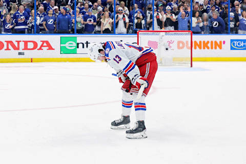 TAMPA, FLORIDA – JUNE 11: Alexis Lafreniere #13 of the New York Rangers reacts after being defeated by the Tampa Bay Lightning with a score of 1 to 2 in Game Six of the Eastern Conference Final of the 2022 Stanley Cup Playoffs at Amalie Arena on June 11, 2022 in Tampa, Florida. (Photo by Andy Lyons/Getty Images)