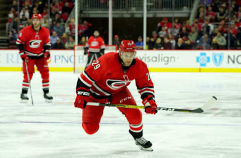 RALEIGH, NC – OCTOBER 29: Brian Gibbons #29 of the Carolina Hurricanes skates for position on the ice during an NHL game against the Calgary Flames on October 29, 2019 at PNC Arena in Raleigh, North Carolina. (Photo by Gregg Forwerck/NHLI via Getty Images)