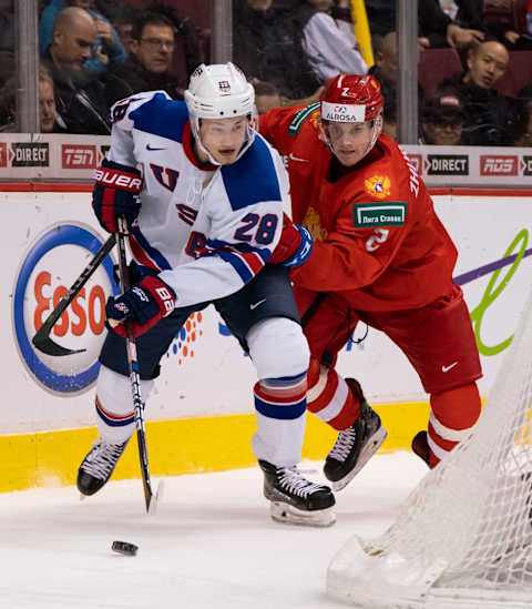 Joel Farabee #28, Danil Zhuravlyov #2 (Photo by Rich Lam/Getty Images)