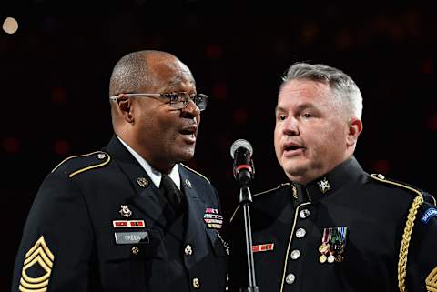 WASHINGTON, DC – JUNE 02: Army Master Sgt. Caleb Green (L) and Master Sgt. Bob McDonald (R) sing the national anthem before Game Three of the 2018 NHL Stanley Cup Final between the Vegas Golden Knights and the Washington Capitals at Capital One Arena on June 2, 2018 in Washington, DC. (Photo by Patrick McDermott/NHLI via Getty Images)