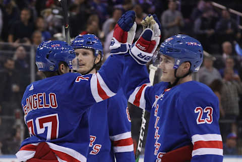 Tony DeAngelo #77, Jacob Trouba #8 and Adam Fox #23 of the New York Rangers (Photo by Bruce Bennett/Getty Images)