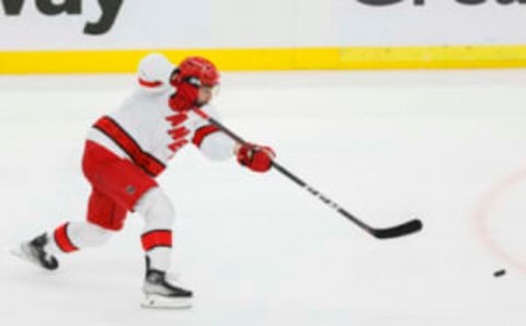 May 24, 2023; Sunrise, Florida, USA; Carolina Hurricanes defenseman Shayne Gostisbehere (41) shoots the puck against the Florida Panthers during the third period in game four of the Eastern Conference Finals of the 2023 Stanley Cup Playoffs at FLA Live Arena. Mandatory Credit: Sam Navarro-USA TODAY Sports