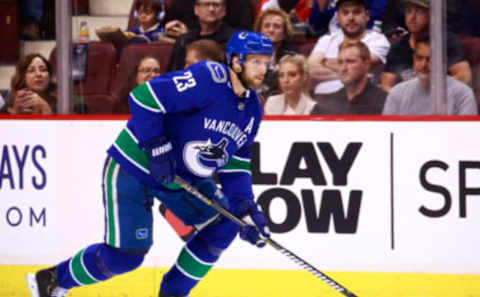 VANCOUVER, BC – MARCH 20: Alexander Edler #23 of the Vancouver Canucks skates up ice during their NHL game against the Ottawa Senators at Rogers Arena March 20, 2019 in Vancouver, British Columbia, Canada. (Photo by Jeff Vinnick/NHLI via Getty Images)”n