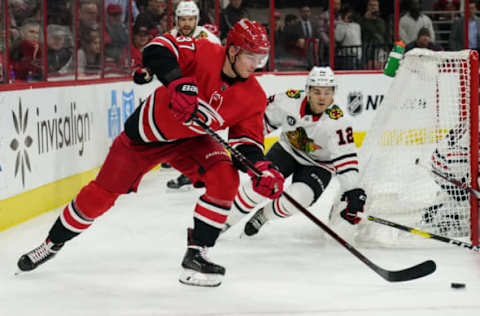 RALEIGH, NC – NOVEMBER 12: Carolina Hurricanes Right Wing Andrei Svechnikov (37) centers the puck from being the net during a game between the Chicago Blackhawks and the Carolina Hurricanes at the PNC Arena in Raleigh, NC on November 12, 2018. (Photo by Greg Thompson/Icon Sportswire via Getty Images)