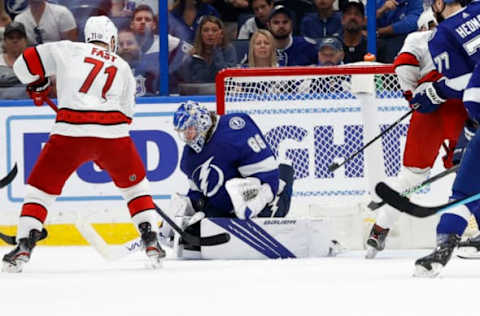 Jun 5, 2021; Tampa, Florida, USA; Tampa Bay Lightning goaltender Andrei Vasilevskiy (88) makes a save against the Carolina Hurricanes during the third period in game four of the second round of the 2021 Stanley Cup Playoffs at Amalie Arena. Mandatory Credit: Kim Klement-USA TODAY Sports