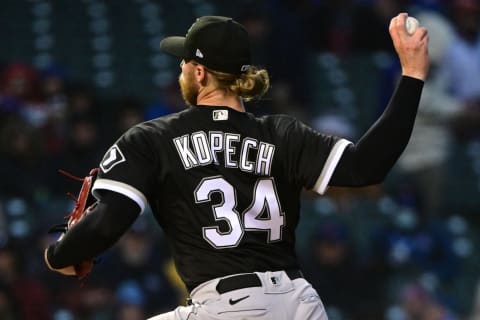 May 3, 2022; Chicago, Illinois, USA; Chicago White Sox starting pitcher Michael Kopech (34) delivers the ball in the first inning against the Chicago Cubs at Wrigley Field. Mandatory Credit: Quinn Harris-USA TODAY Sports