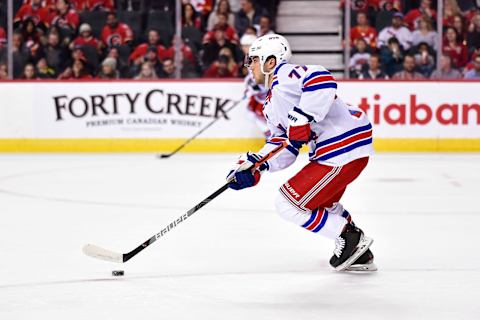 CALGARY, AB – JANUARY 02: New York Rangers Defenceman Tony DeAngelo (77) skates with the puck during the third period of an NHL game where the Calgary Flames hosted the New York Rangers on January 2, 2020, at the Scotiabank Saddledome in Calgary, AB. (Photo by Brett Holmes/Icon Sportswire via Getty Images)