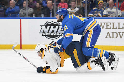 ST. LOUIS, MO. – FEBRUARY 09: St. Louis Blues defenseman Robert Bortuzzo (41) collides with Nashville Predators center Nick Bonino (13) during an NHL game between the Nashville Predators and the St. Louis Blues on February 09, 2019, at Enterprise Center, St. Louis, MO. (Photo by Keith Gillett/Icon Sportswire via Getty Images)