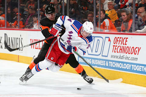 PHILADELPHIA, PA – FEBRUARY 28: Philippe Myers #5 of the Philadelphia Flyers checks Kaapo Kakko #24 of the New York Rangers in the second period at the Wells Fargo Center on February 28, 2020 in Philadelphia, Pennsylvania. (Photo by Mitchell Leff/Getty Images)