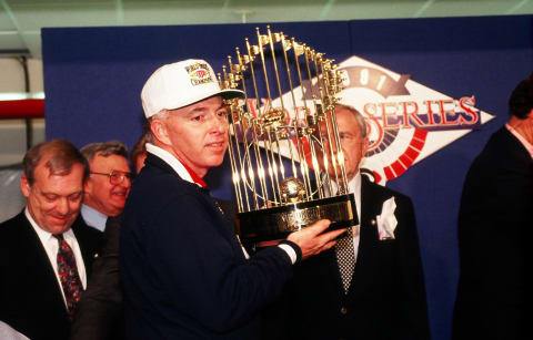 Twins manager Tom Kelly with the 1991 World Series trophy. (Photo by Rich Pilling/Getty Images)