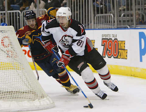 ATLANTA – JANUARY 20: Miroslav Satan #81 of the Buffalo Sabres moves the puck from behind the net against the Atlanta Thrashers at Philips Arena on January 20, 2004 in Atlanta, Georgia. The Thrashers won 4-1. (Photo by Jamie Squire/Getty Images)