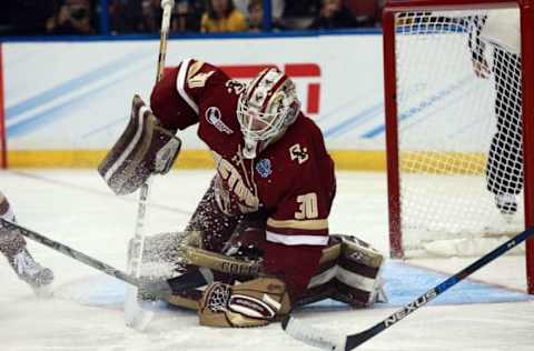 Apr 7, 2016; Tampa, FL, USA; Boston College Eagles goalie Thatcher Demko (30) makes a save against the Quinnipiac Bobcats during the second period of the semifinals of the 2016 Frozen Four college ice hockey tournament at Amalie Arena. Mandatory Credit: Kim Klement-USA TODAY Sports